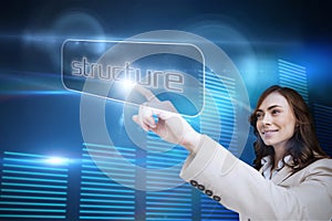 Businesswoman pointing to word structure