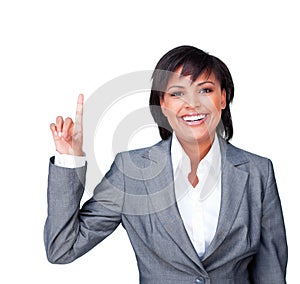 Businesswoman pointing upwards