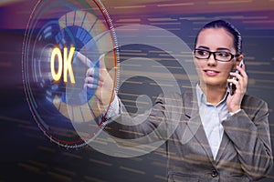 The businesswoman pressing virtual button ok