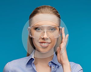 Businesswoman in protective glasses