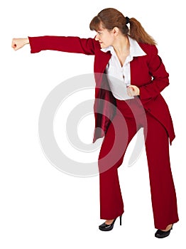 Businesswoman punching isolated on white