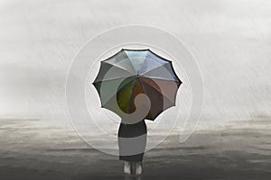 Businesswoman in the rain with a colorful umbrella