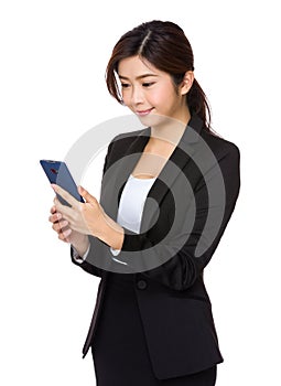 Businesswoman read the message on cellphone