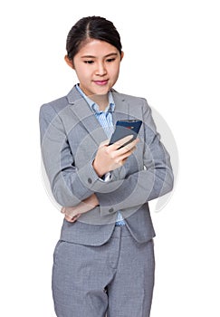 Businesswoman read text message on cellphone