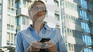 Businesswoman reading bad-news message, failed startup or dismissal, troubles