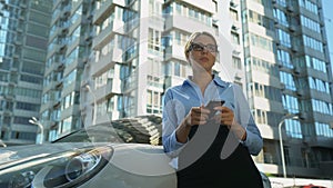 Businesswoman reading bad-news message on smartphone, bankruptcy, failed startup