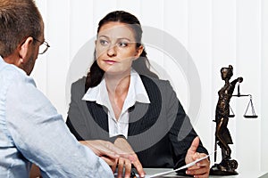 Businesswoman reading a letter