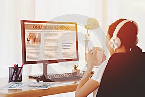 Businesswoman Reading News On Computer