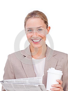 Businesswoman reading a newspaper