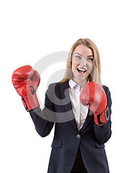 Businesswoman in red boxing gloves against white background