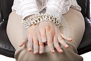 Businesswoman's hands tied