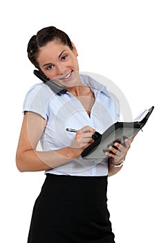 Businesswoman scheduling an appointment