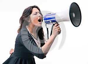 Businesswoman screaming on megaphone