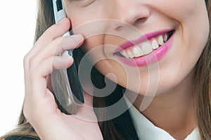 Businesswoman or secretary talking by phone