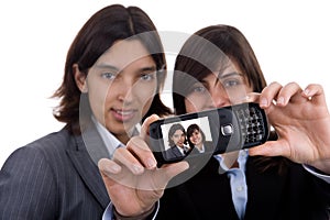 Businesswoman selfportrait with mobile phone photo