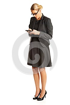 Businesswoman sending a message