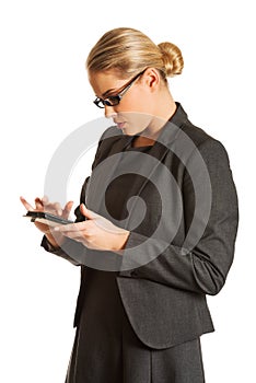 Businesswoman sending a message