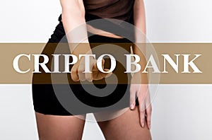 Businesswoman in short skirt pressing cripto bank button of a virtual screen. exchange and production of crypto currency