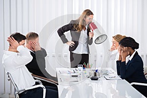 Businesswoman Shouting Through Megaphone