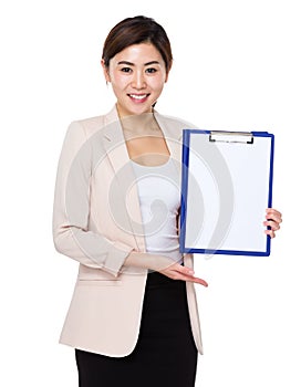 Businesswoman show with blank page of clipboard