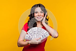 Businesswoman showing fan dollars