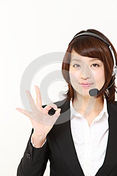Businesswoman showing perfect sign