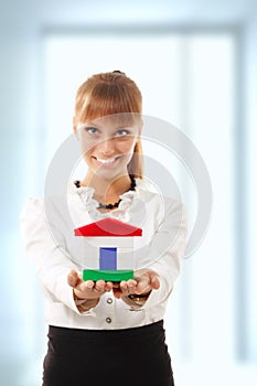 Businesswoman is showing realestate photo