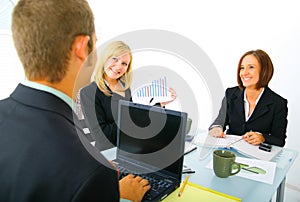 Businesswoman Showing Sales Chart