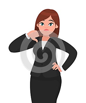 Businesswoman showing thumbs down gesture/sign. Dislike, disapprove, rejection, disagree concept.