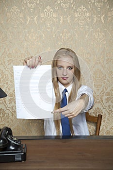 Businesswoman showing where to sign a contract