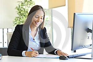 Businesswoman signing a contract