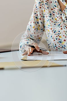 Businesswoman signing a document