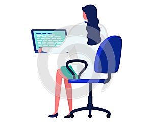 Businesswoman sitting at desk working on laptop. Professional female in office attire using computer. Career woman and