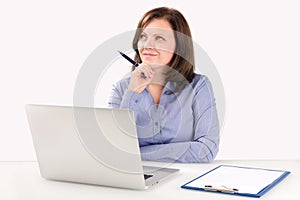Businesswoman is sitting in front of a laptop photo
