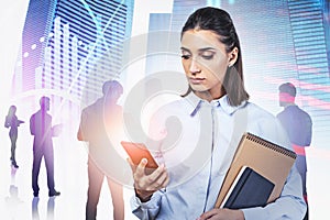 Businesswoman with smartphone and her team