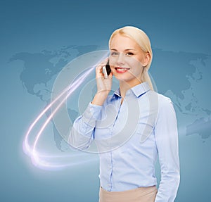 Businesswoman with smartphone over blue background