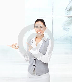 Businesswoman smile point finger white card board