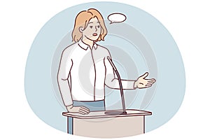 Businesswoman speak in microphone at conference