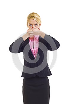 Businesswoman in the Speak No Evil pose