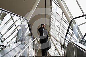 Businesswoman on Stairs - Horizontal