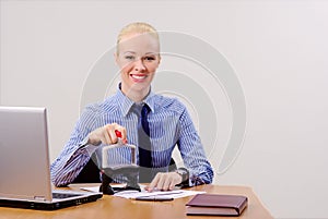 Businesswoman stamping documents