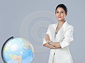 Businesswoman standing with arms crossed