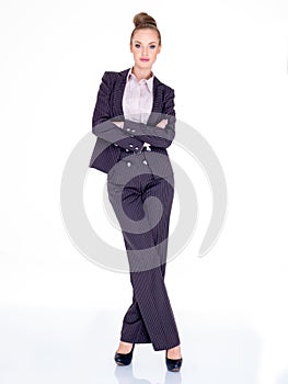 Businesswoman Standing with Arms Crossed in Studio