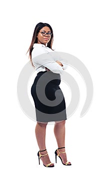 Businesswoman standing with arms folded