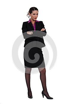 Businesswoman standing cross-armed