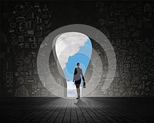 Businesswoman standing at the exit