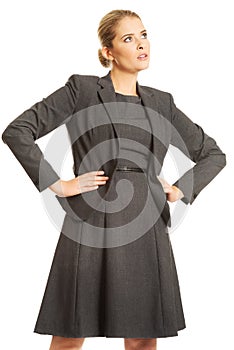 Businesswoman standing with hands on hips