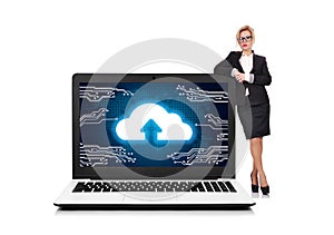 Businesswoman standing near  laptop and cloud computing interface