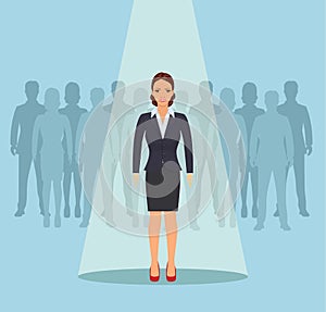 Businesswoman standing in spotlight