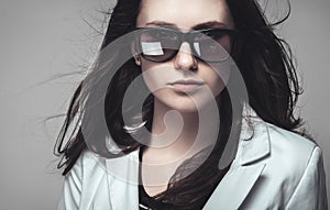 Businesswoman staring through sunglasses